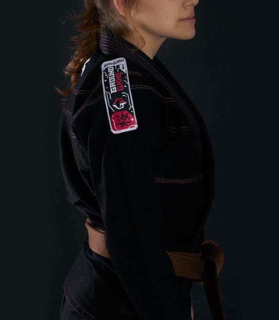 Left side view of a Ground Game Sakura BJJ Women`s Gi Black