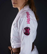 Side view of a Ground Game Sakura BJJ Women`s Gi White