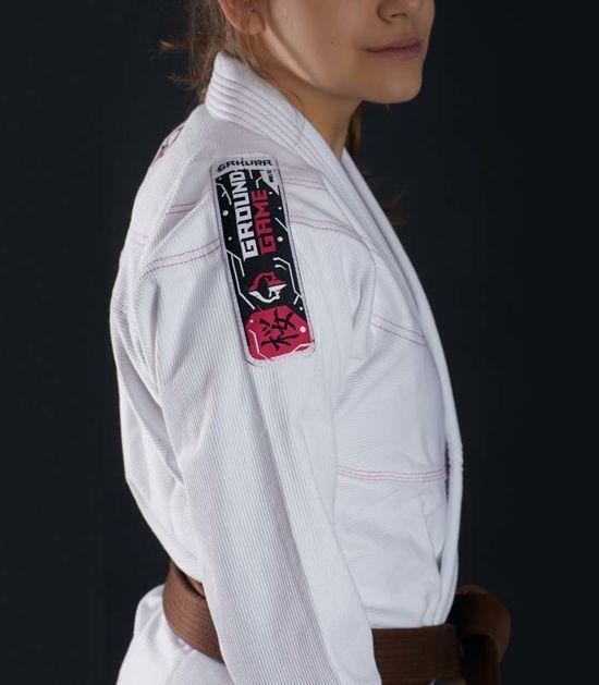 Side view of a Ground Game Sakura BJJ Women`s Gi White